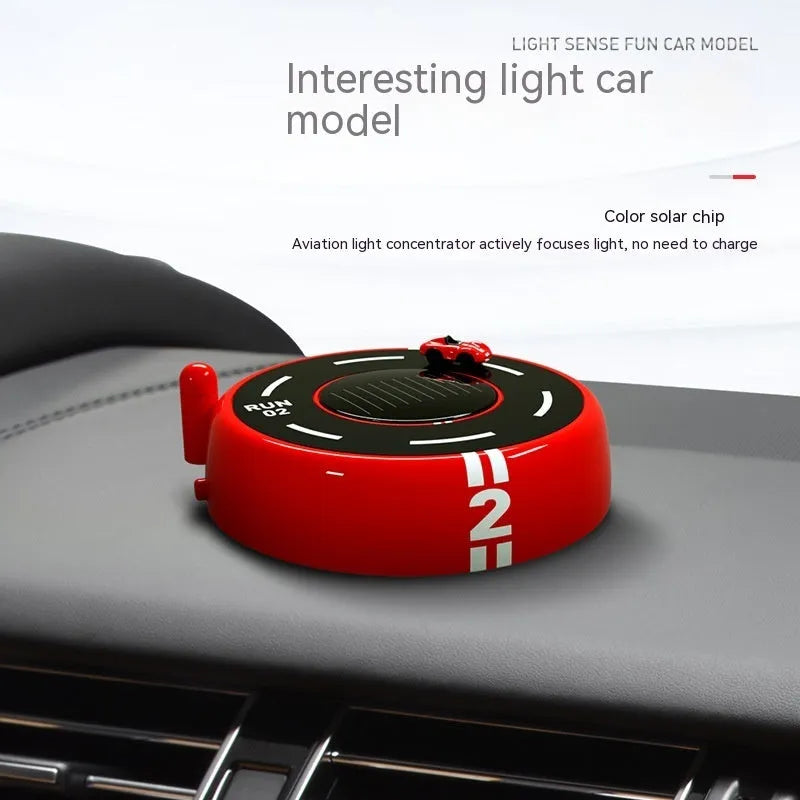 Round solar car fragrance light decoration in choice of black, red or white plastic