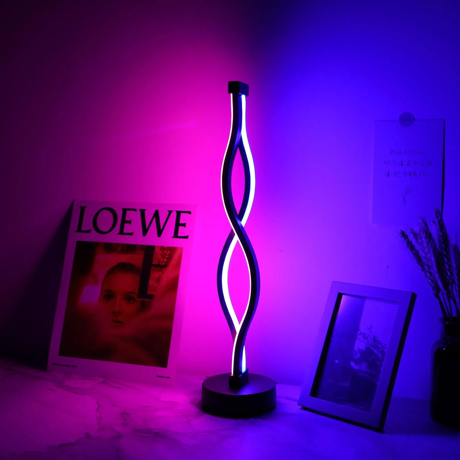 Black aluminium desk lamp with button and touch controls for three-colour dimming