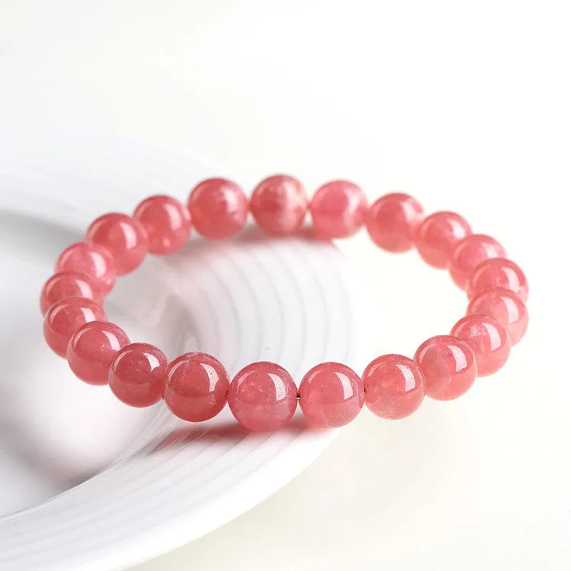 Women's geometric crystal bracelet with longevity lock design in red rhodochrosite stone