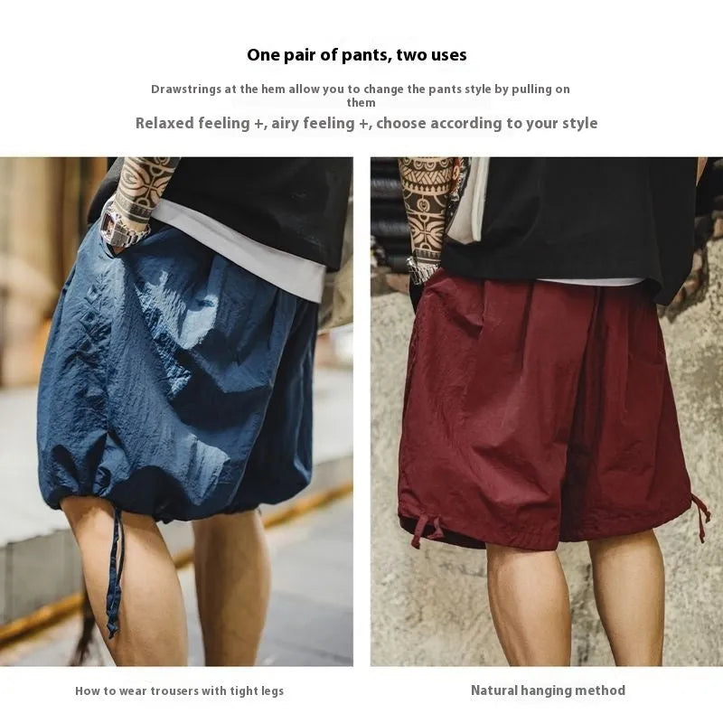 Prussian Blue men's nylon beach shorts with embroidered details and loose fit