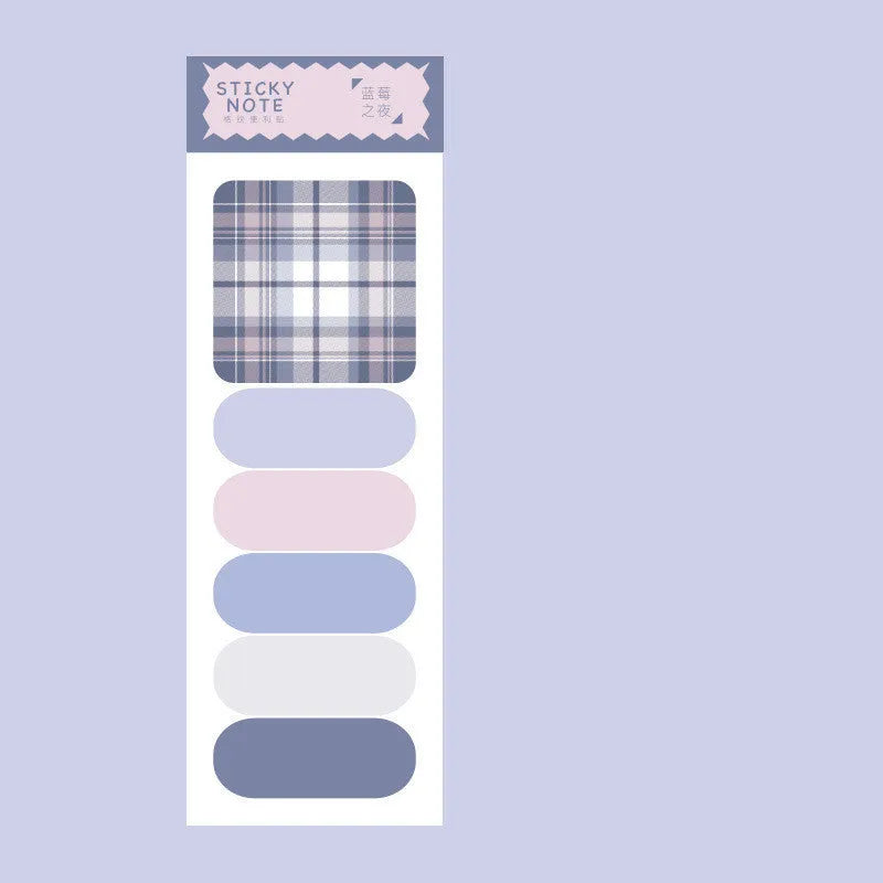 Colourful sticky notes memo pad showing six different designs with plaid and solid colours
