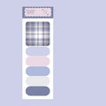 Colourful sticky notes memo pad showing six different designs with plaid and solid colours