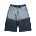 Blue tie-dye gradient cropped jeans with a washed-out, worn-in look and loose casual fit