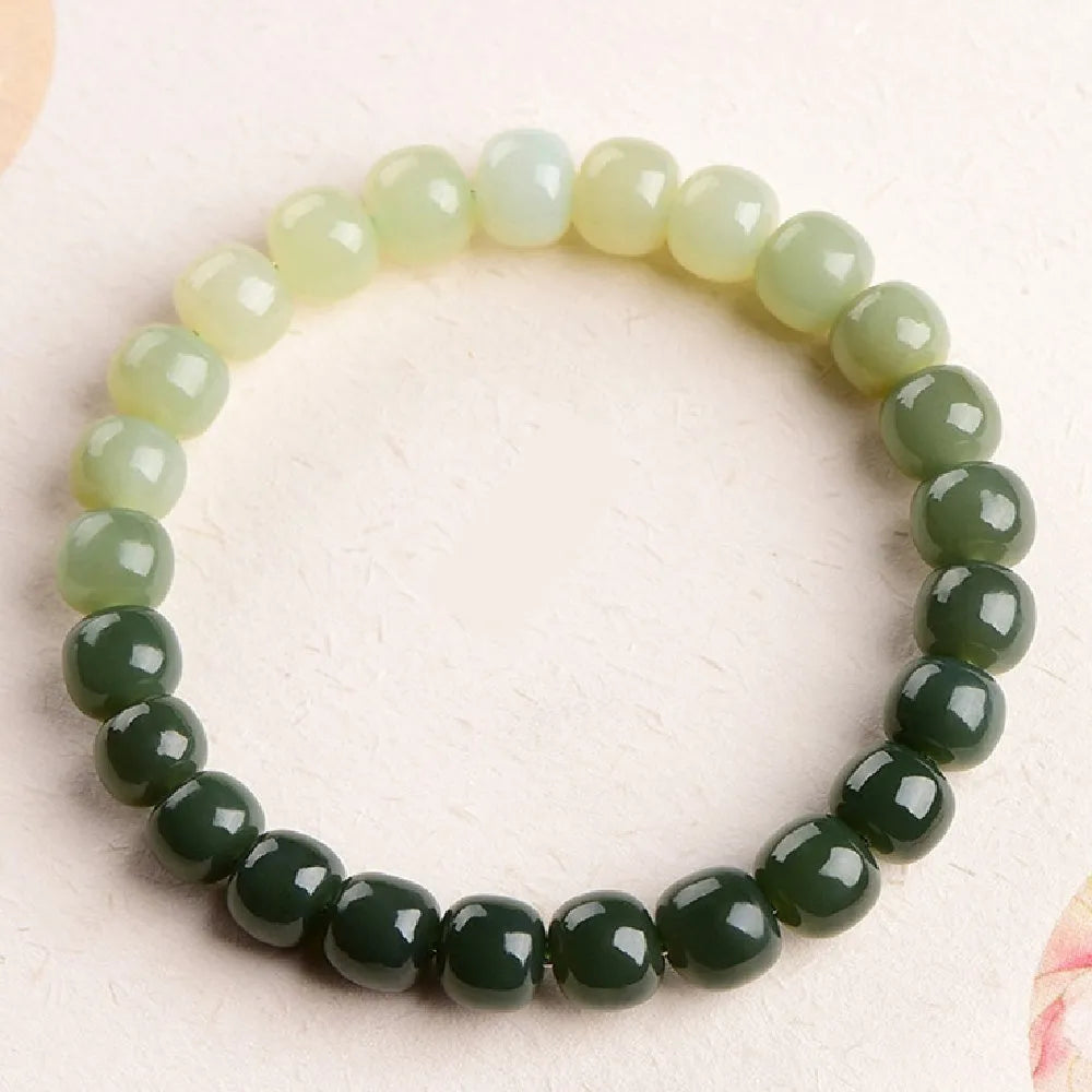 Natural Hetian jade gradient water bracelet with polished beads in water colour aesthetic