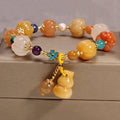 Women's multi-layer crystal bracelet with Korean design featuring natural garnet and assorted gemstone pendants