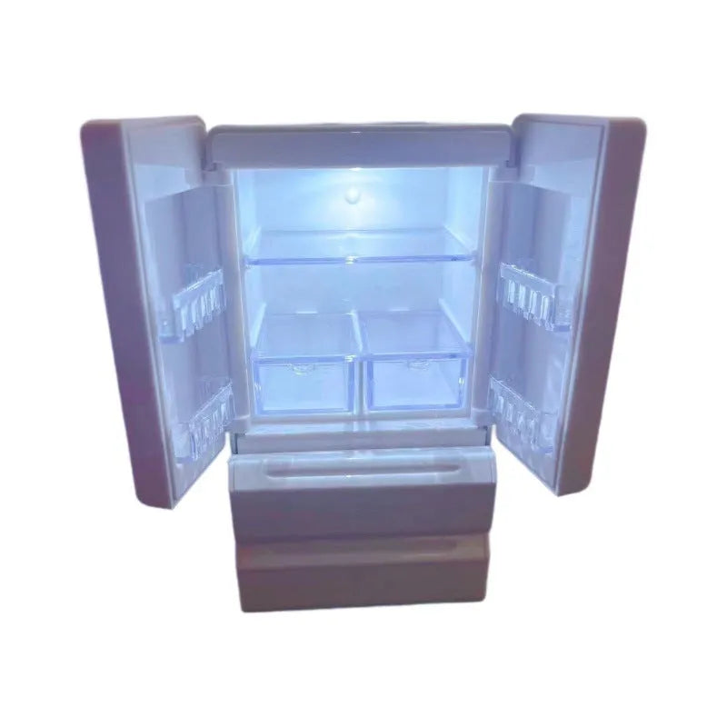 White plastic miniature candy shop toy model with LED light-up feature on display
