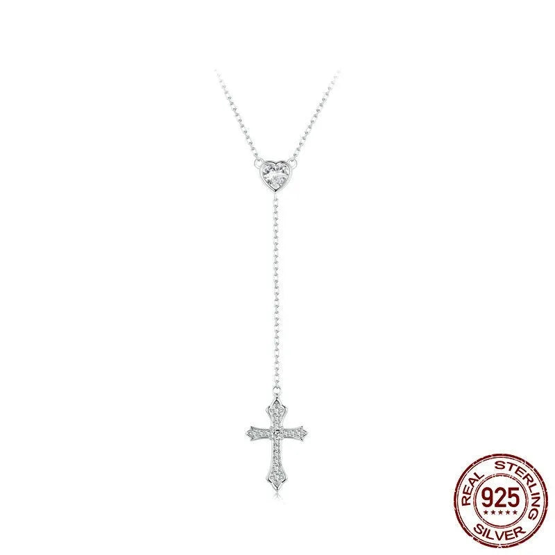 Simple silver love cross pendant necklace with O-ring chain on a female model, colour BSN384.