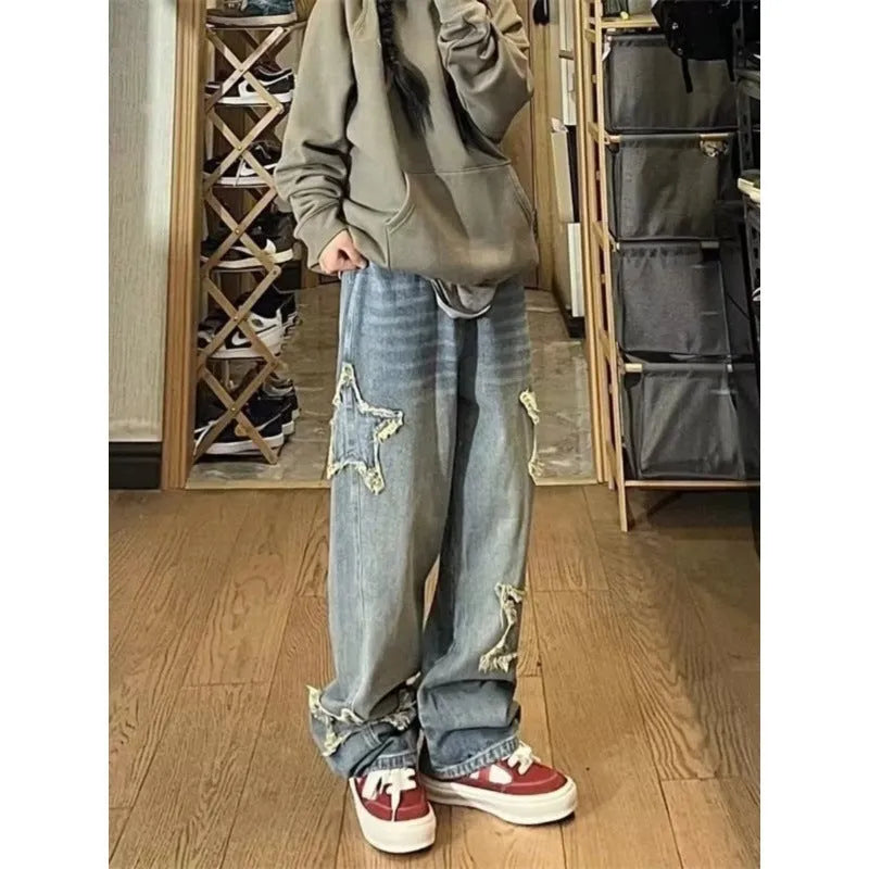 Blue cotton denim wide-leg high waist pants laid flat showing straight leg cut