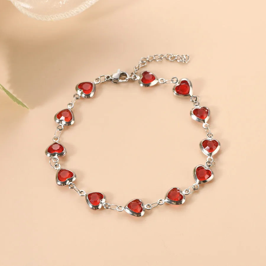 Geometric heart-shaped stainless steel bracelet with electroplated colourful finish on wrist