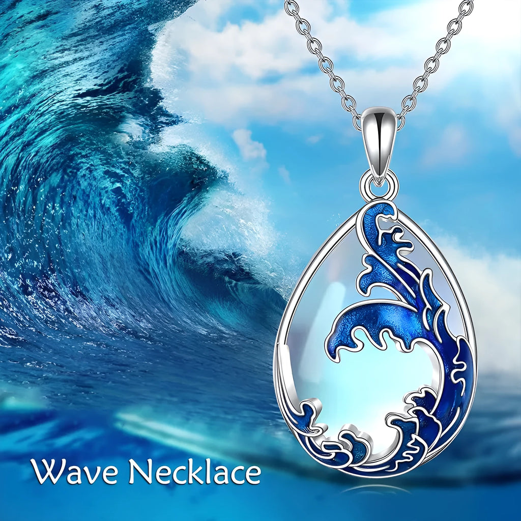 Blue heart-shaped alloy pendant necklace on a chain.