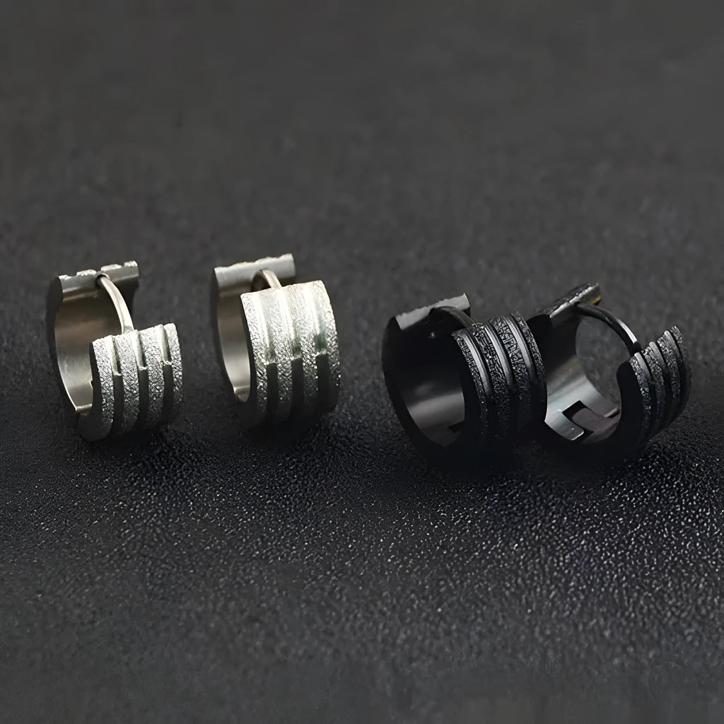 Geometric three-line frosted titanium steel earrings in Korean style on a white background.