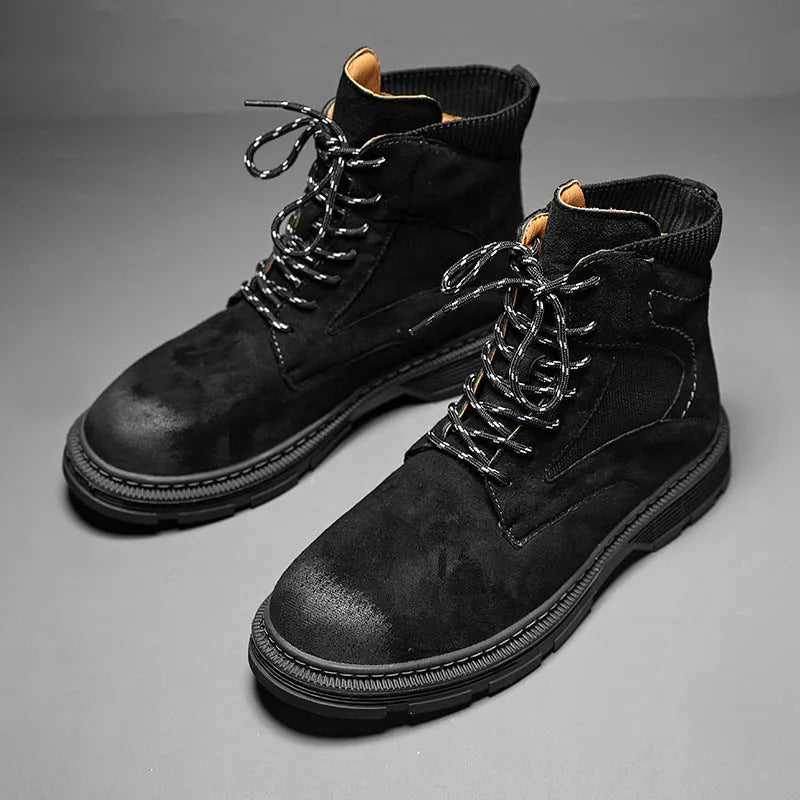 Men's vintage round toe Martin boots in black, grey, and sand colours with a low thick heel.