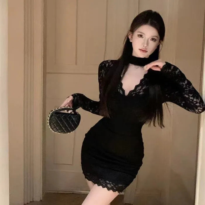 Women's black halter neck lace dress with floral pattern and A-line skirt