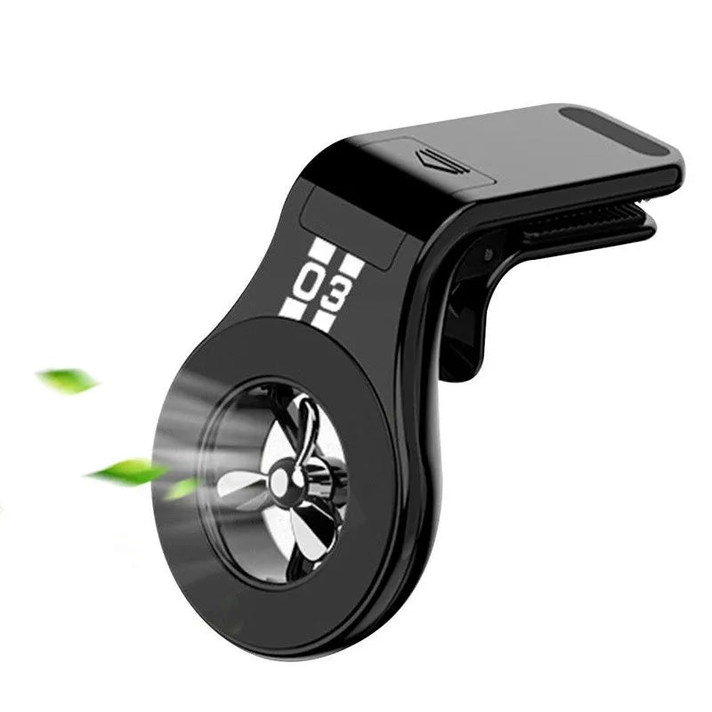 Black magnetic car phone holder attached to vehicle air vent with smartphone mounted