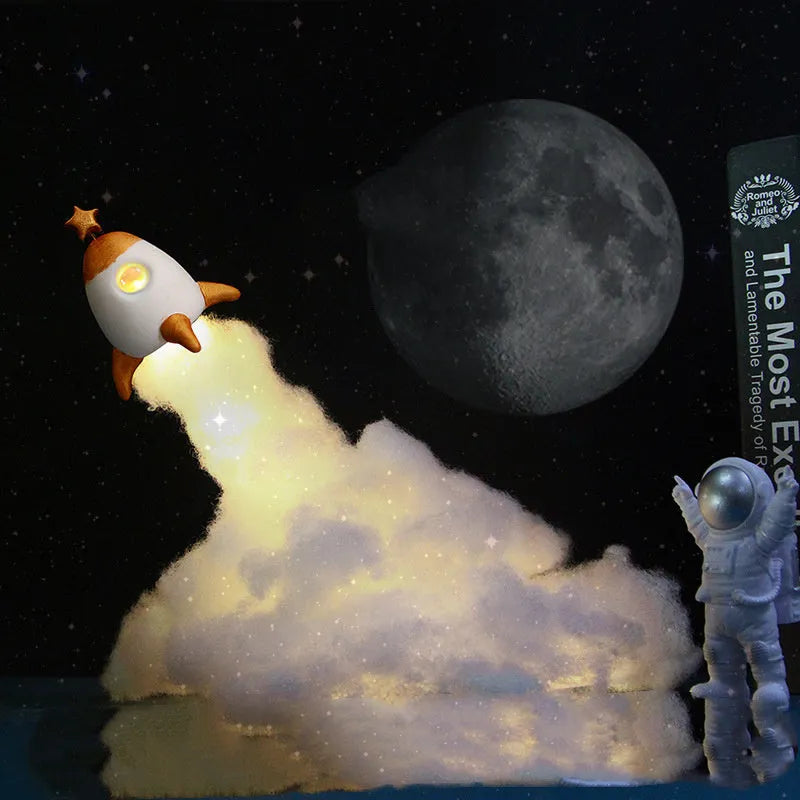 DIY astronaut rocket night light kit components with LED string lights and 19cm circular base