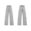 Men's dark blue cotton straight-leg jeans with loose fit, showing heavy 3D cutting, belt stitching, and decorative zip details.