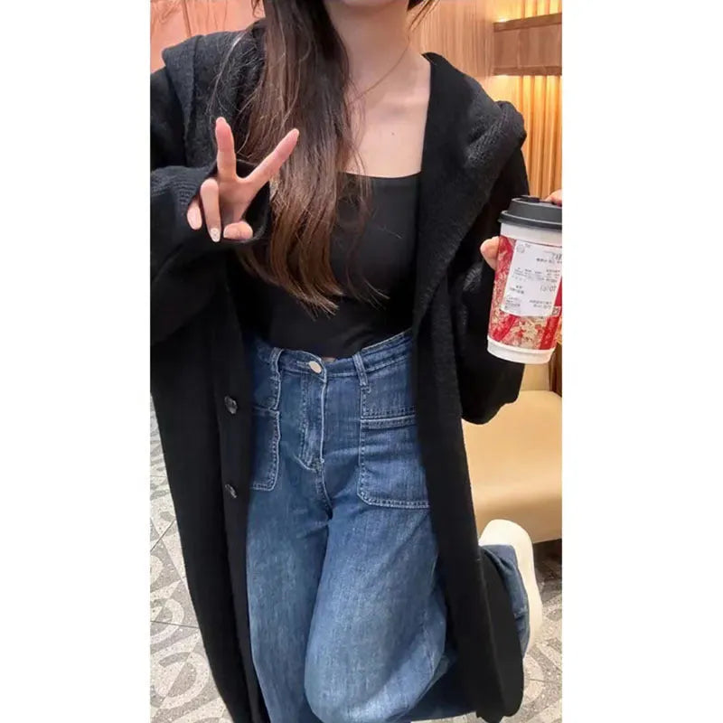 Korean style women's hooded knitted cardigan in wool blend fabric showing below-knee length and loose fit