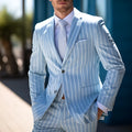 Blue British-style men's suit jacket with white buttons and double-button front