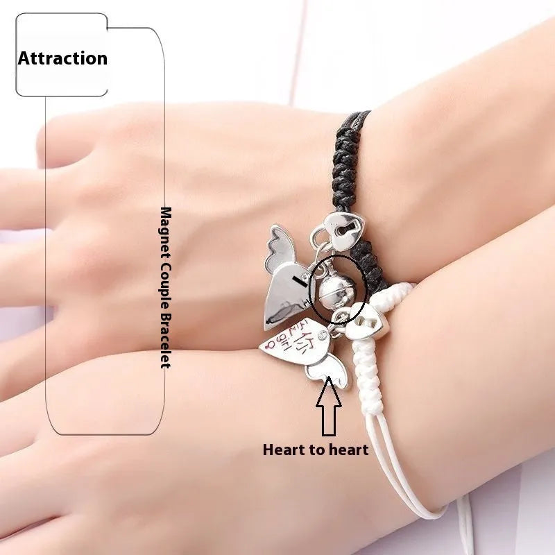 Magnetic couple bracelet pair showing crown design with electroplated alloy construction and magnetic fastening