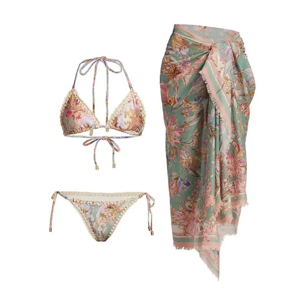 Women's floral print bikini set with matching skirt in creamy-white beige colour