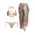 Women's floral print bikini set with matching skirt in creamy-white beige colour
