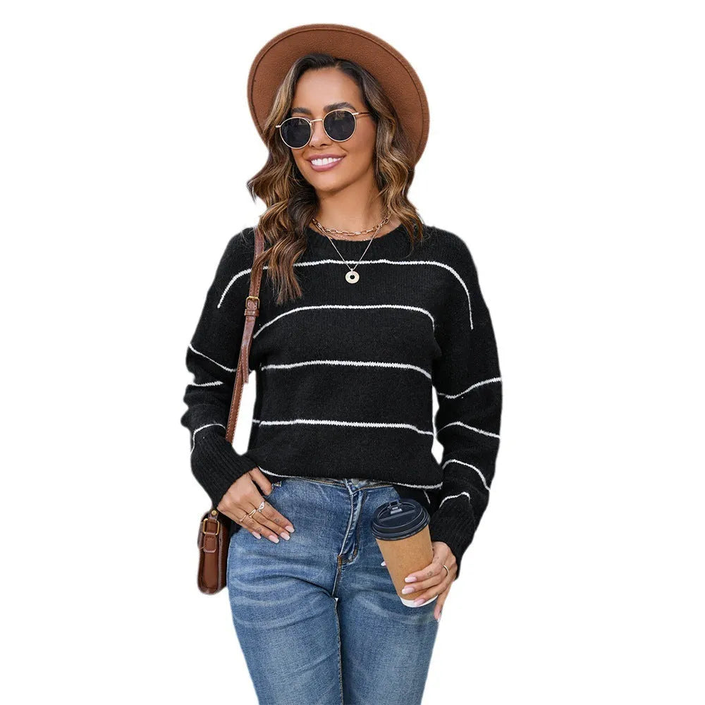 Women's striped pullover sweater in loose fit street fashion style available in black or white