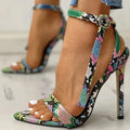 Serpentine blue women's high heels with hollow-out detailing and a buckle fastening on the ankle strap