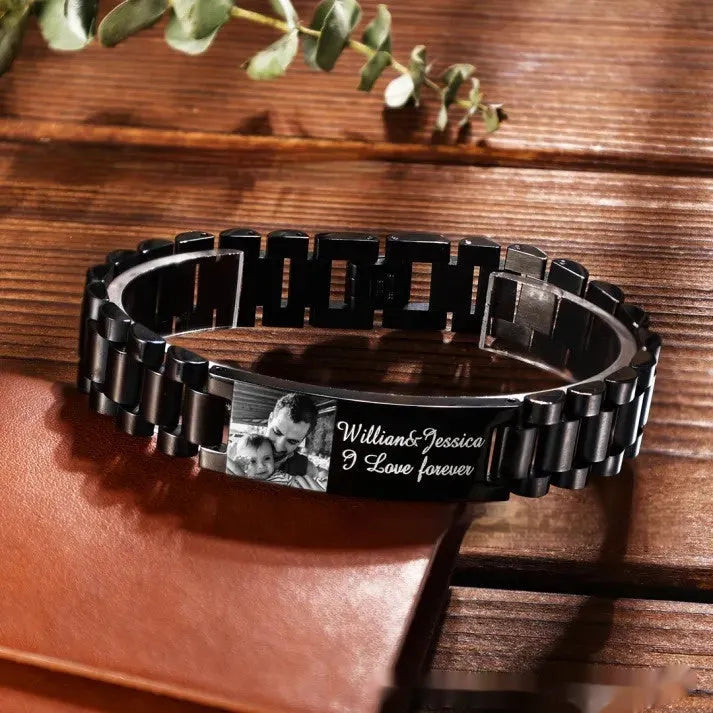Titanium steel lettering bracelet with curved heart shape design showing black engraved lettering