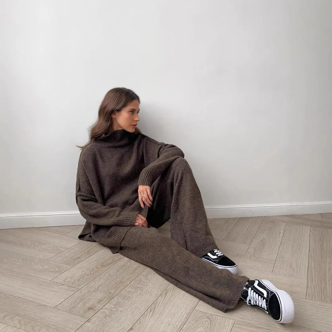 Women's side-slit sweater suit set with matching trousers in solid pattern design