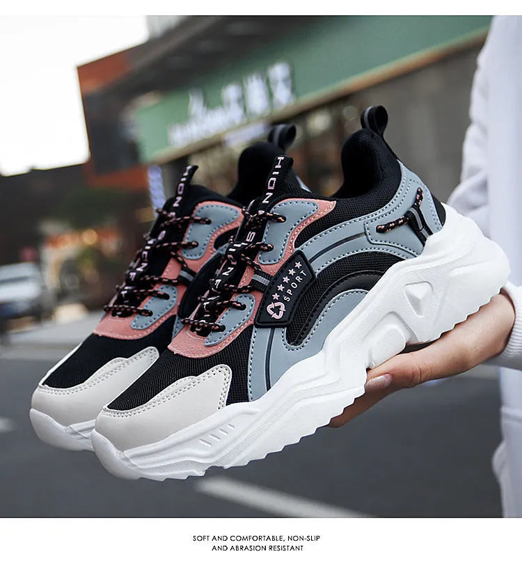 Women's white and moonlight coloured sports shoes with mesh upper and thick sole