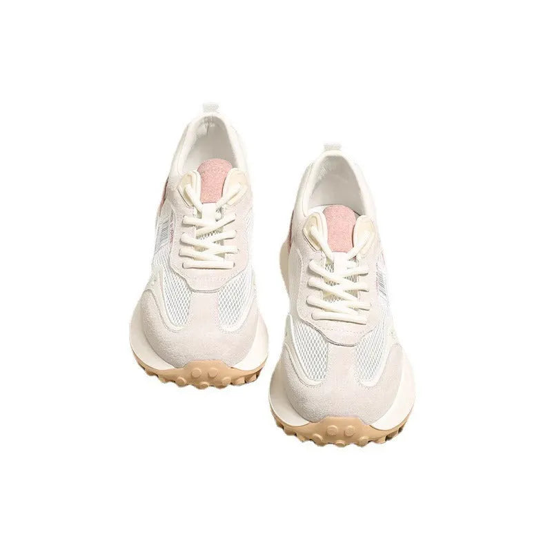 Women's casual retro sneaker in grey or pink with low-top design and round toe