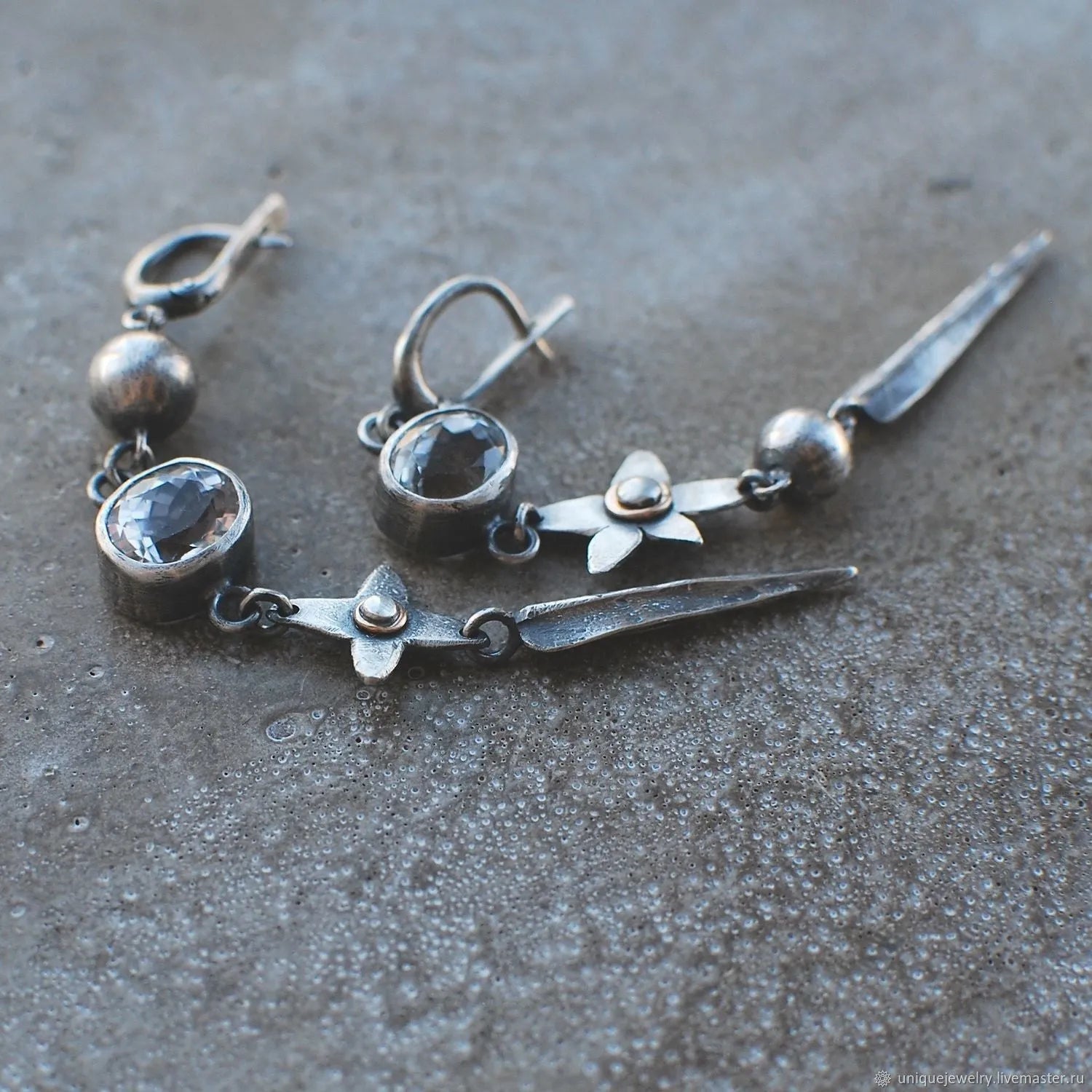Geometric long pendant earrings with XINGX design and rhinestones in antique silver
