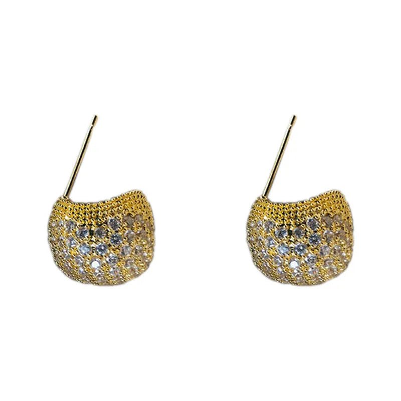 Gold and white geometric drop earrings with flashing lights and spherical elements