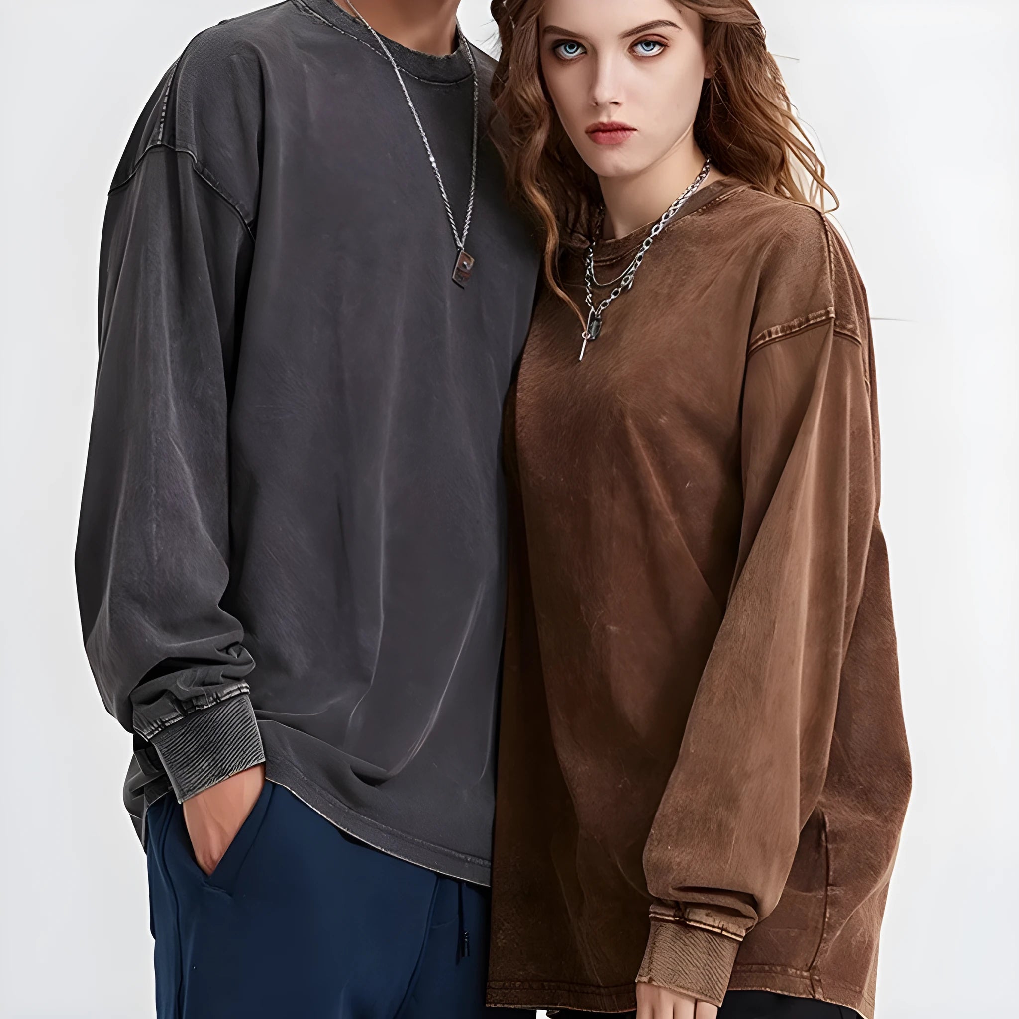 Man wearing a loose-fit batik wash cotton long sleeve pullover in a dark colour.