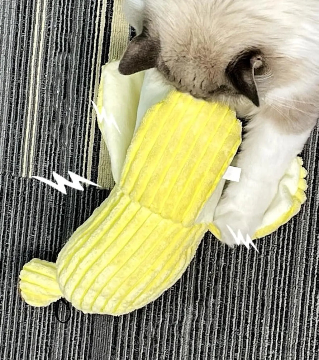 Yellow banana-shaped cat toy with plush fabric and crinkle paper inside.