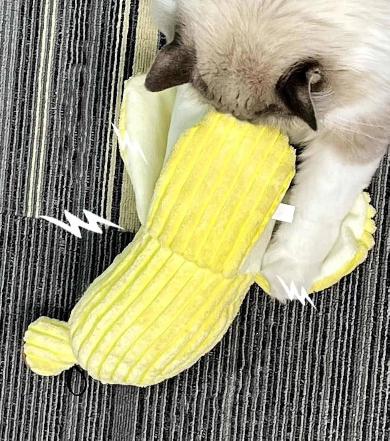 Yellow banana-shaped cat toy with plush fabric and crinkle paper inside.