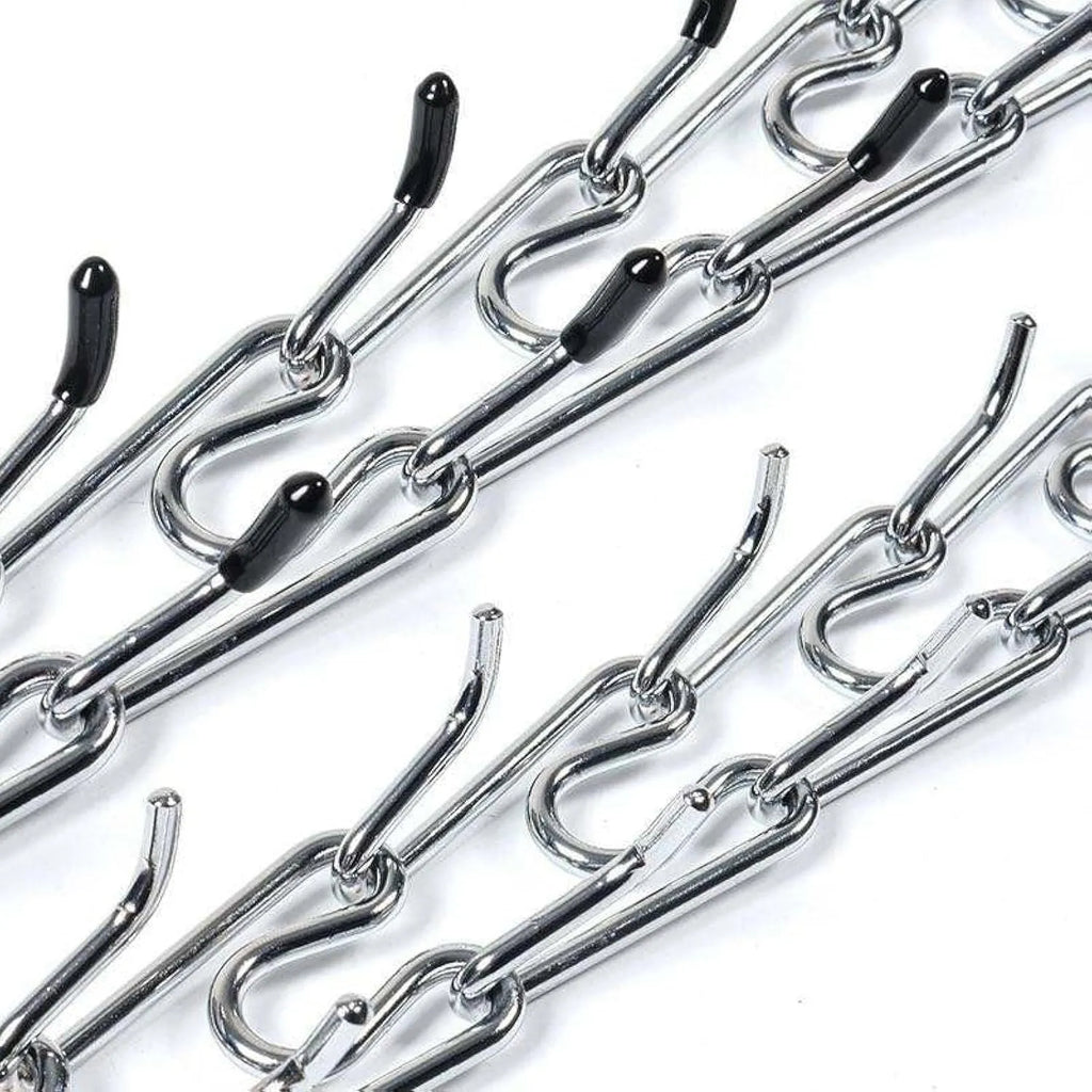 Stainless steel dog prong training collar with rubber tips, shown with adjustable links in four sizes.