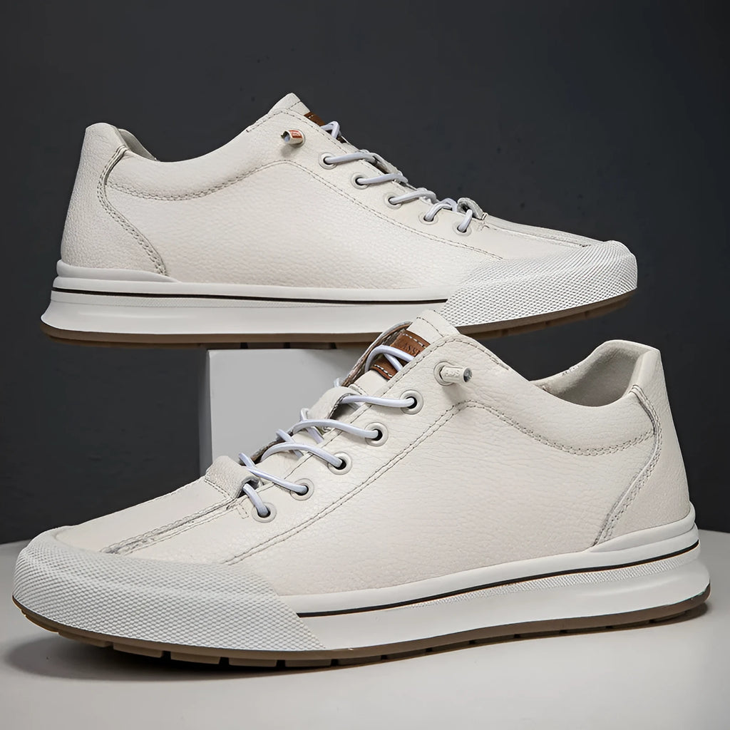 Men's white and black platform trainers with round toe and 6cm heel.