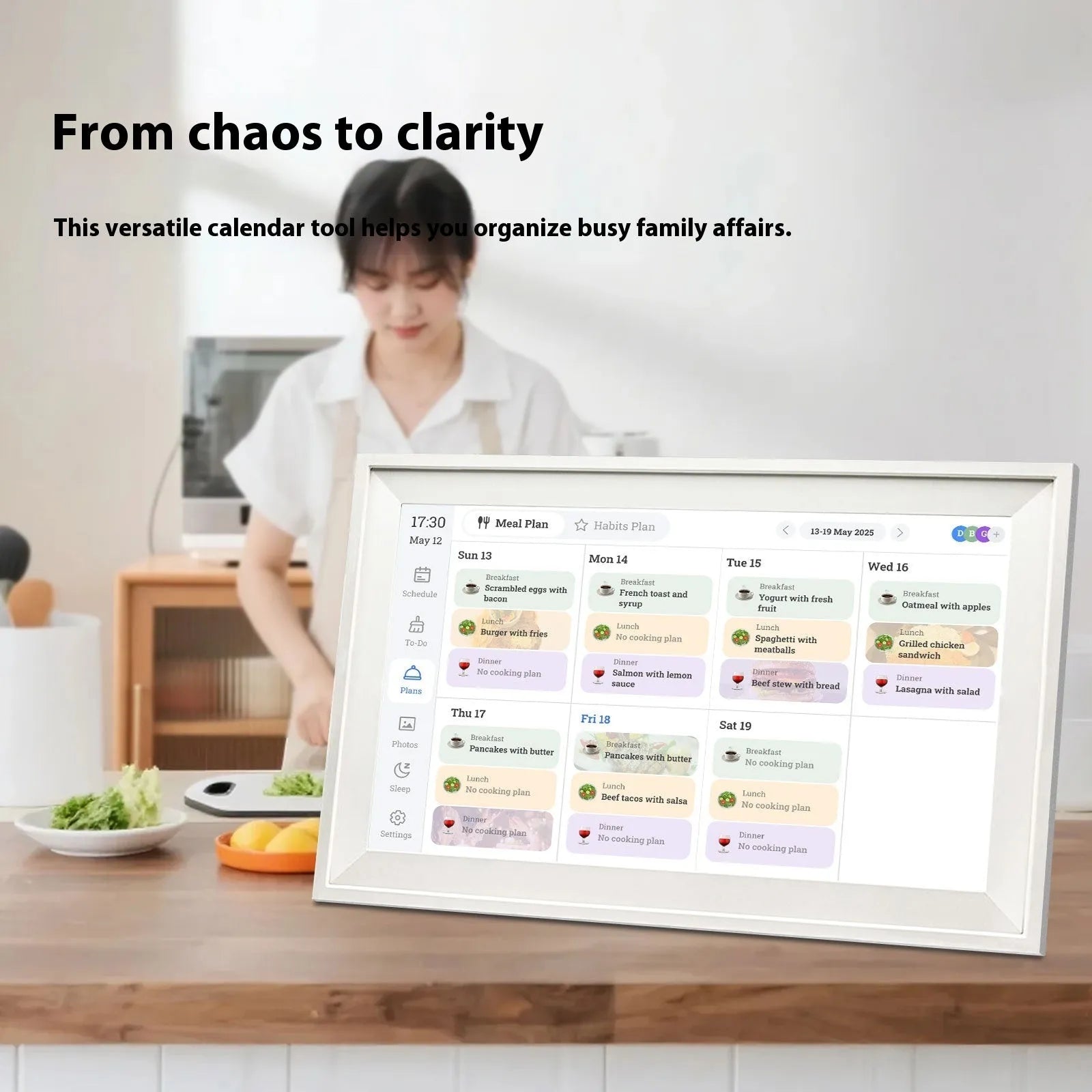 White 15.6 inch smart digital photo frame with app control on wooden table