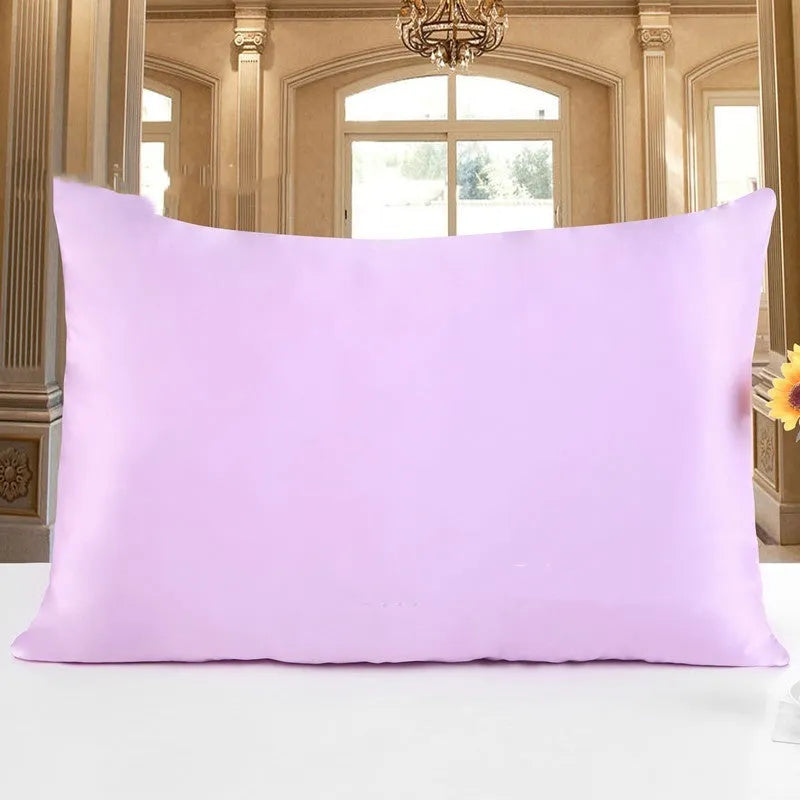 19 M double-sided silk pillowcase in apricot colour, showing envelope closure and smooth fabric texture.
