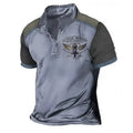 Loose fit 3D printed golf polo shirt in solid colour on a hanger.