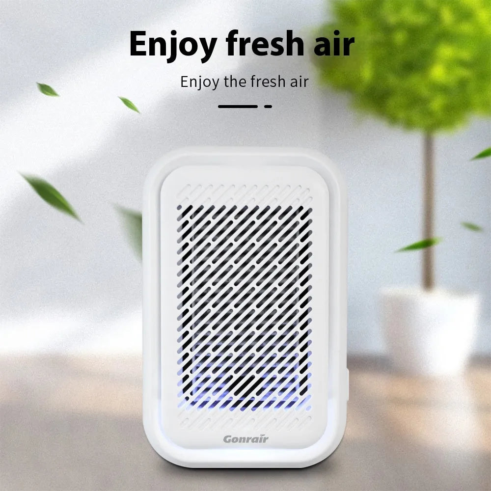 White wall-mounted air purifier with filter screen for small rooms