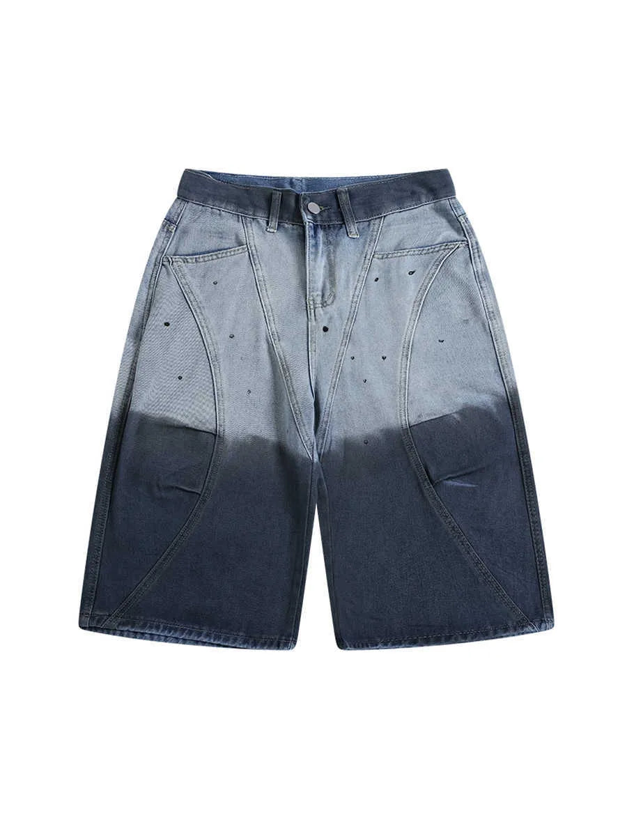 Blue tie-dye gradient cropped jeans with a washed-out, worn-in look and loose casual fit