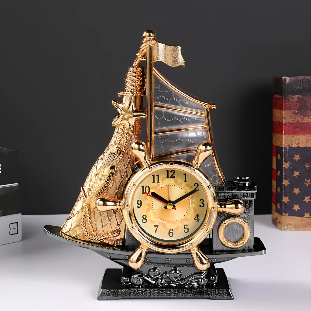 Fashion bedroom alarm clock in choice of gold or silver metallic finish on a surface.