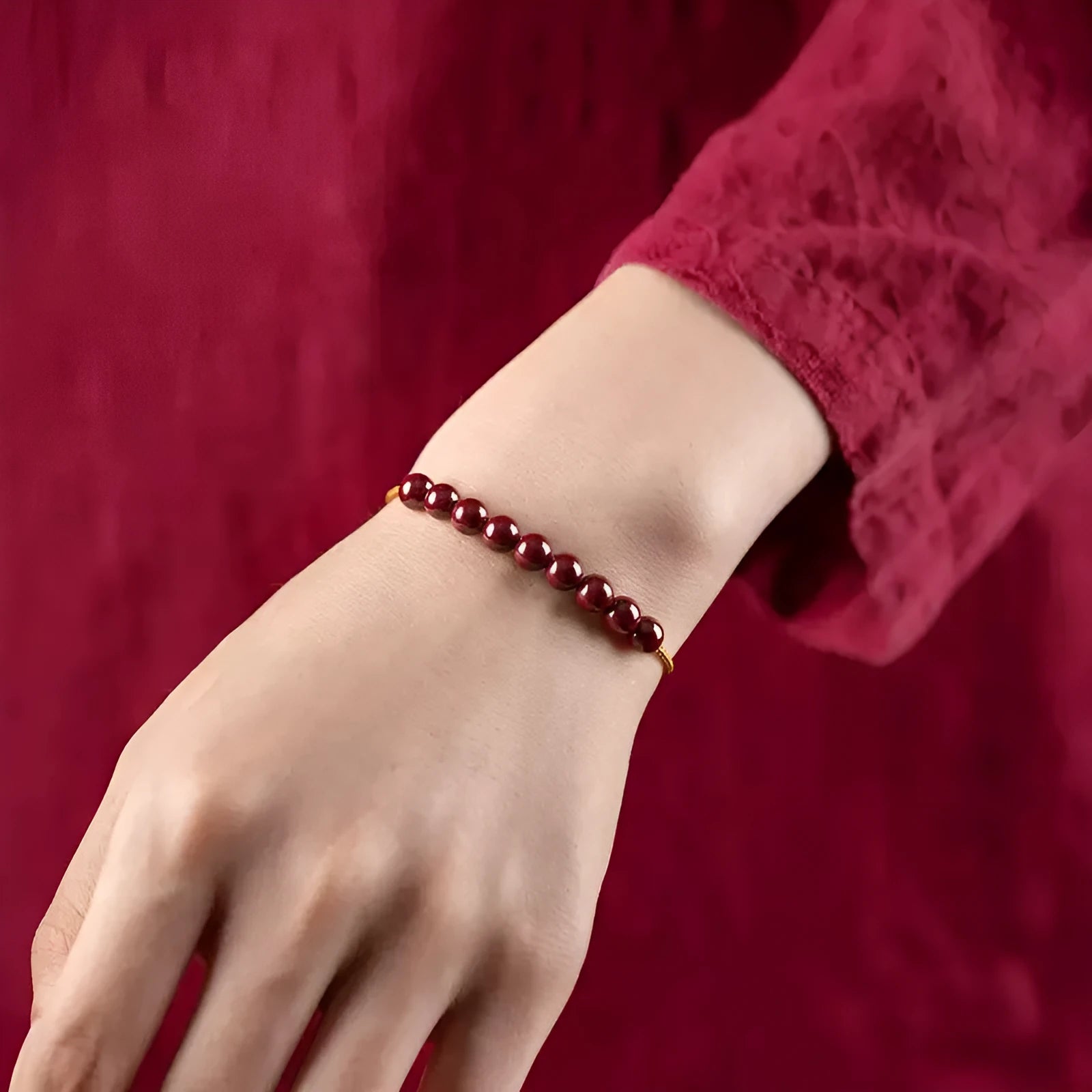 Hand-woven cinnabar and Hetian jade bracelet with geometric design showing natural colour variation