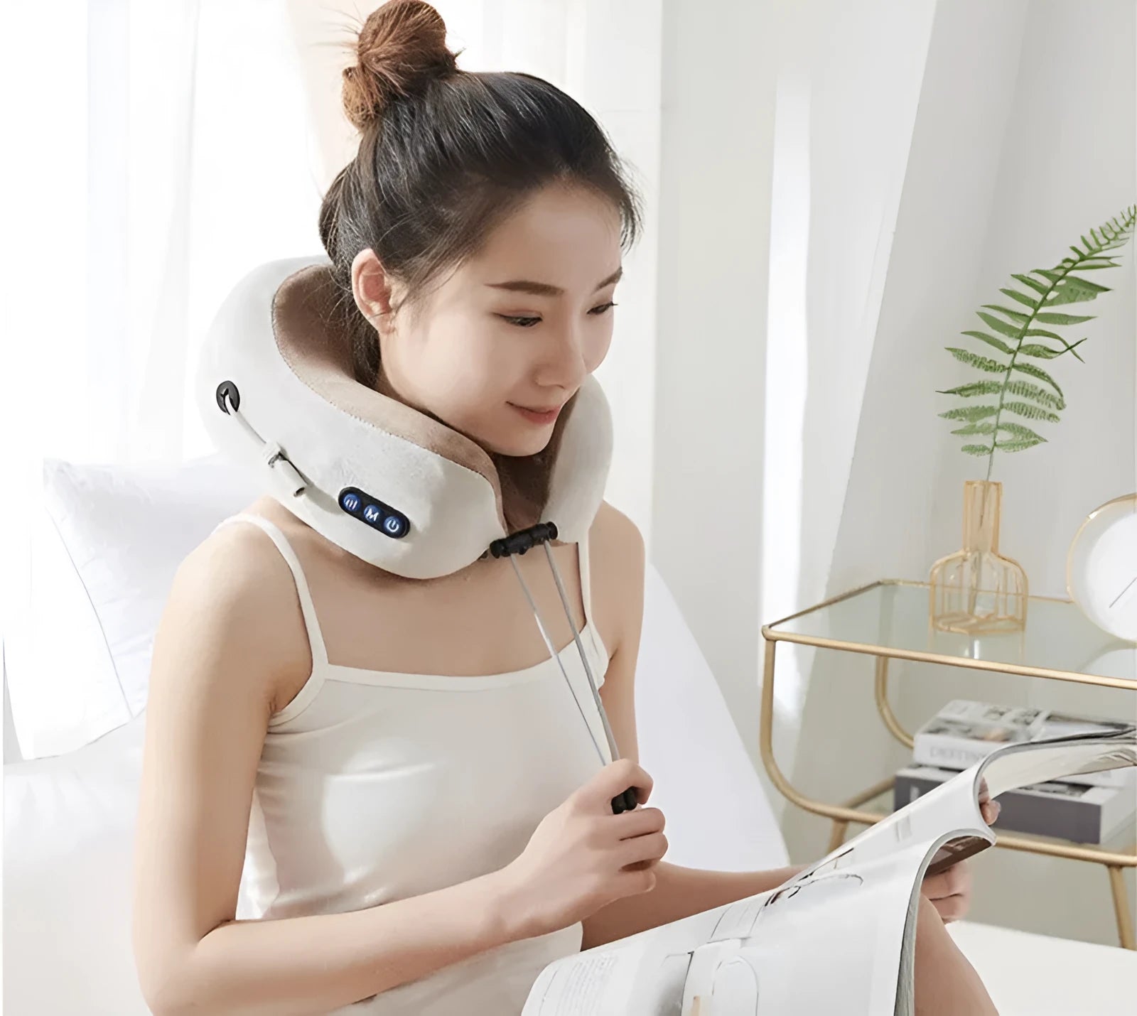 Brown U shaped electric neck massager with massage heads showing kneading and heating functions