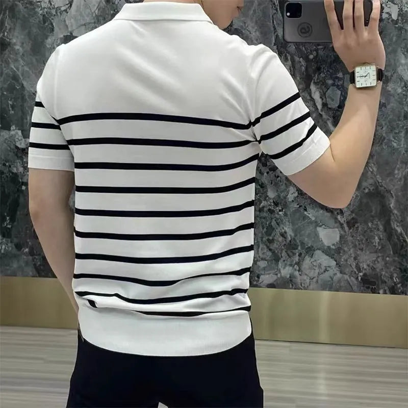 Black and white striped knitted T-shirt with a lapel collar, long sleeves, and a pullover style.