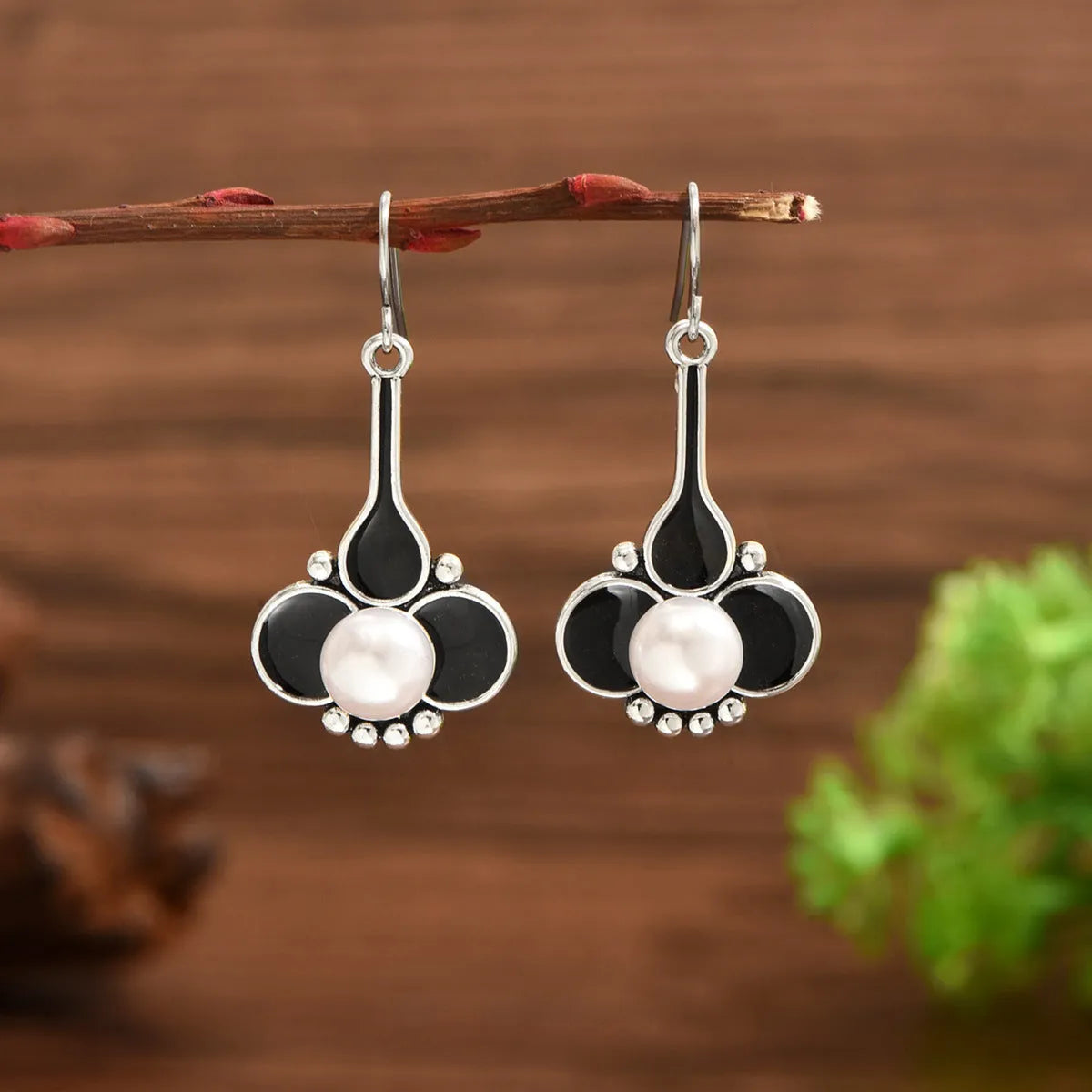 Creative retro fashion earrings with electroplated silver finish and alloy construction