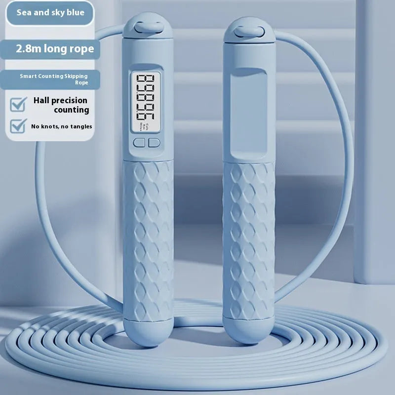 ABS plastic skipping rope with ball-bearing mechanism in various colour options including black, green, navy blue, and pink.