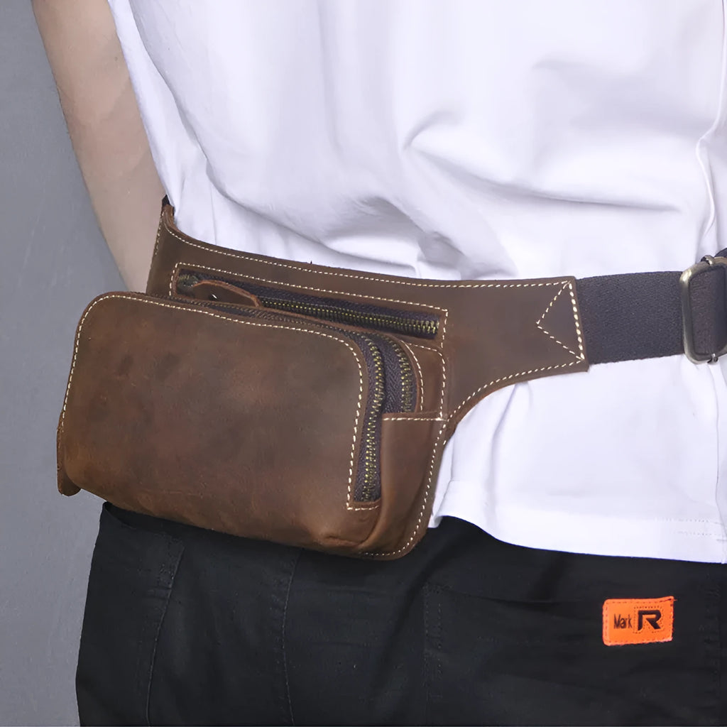 Brown cowhide sports waist bag with phone compartment and laptop space